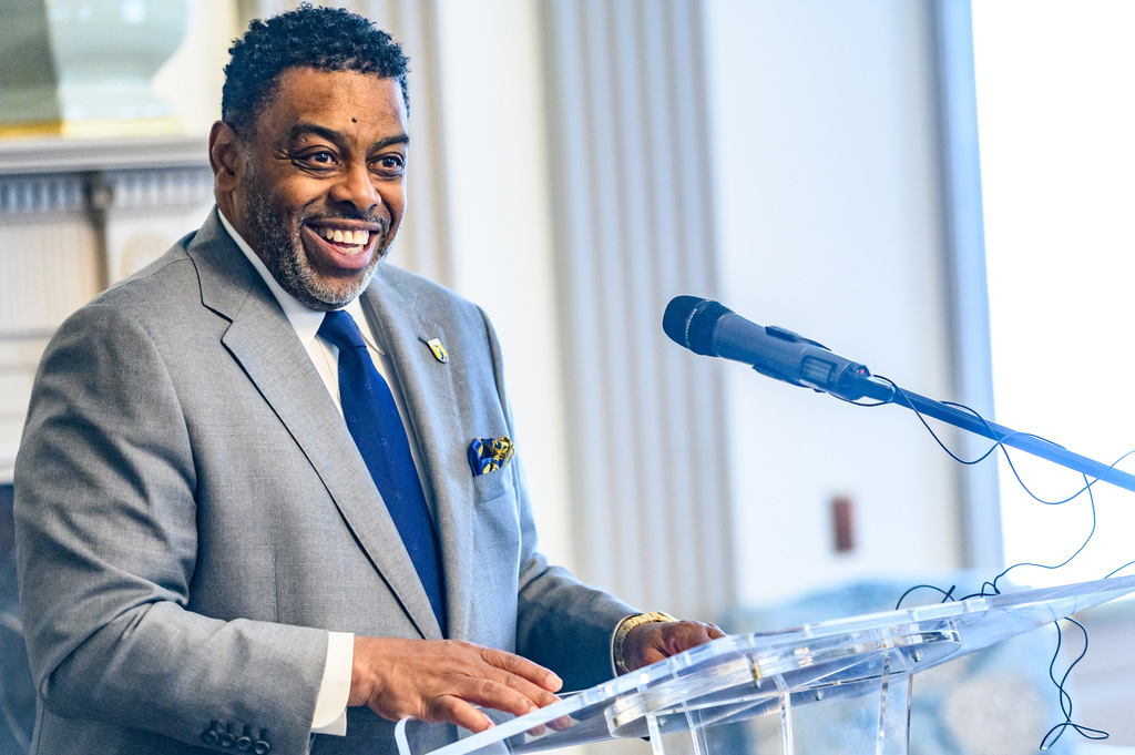 Chancellor Gilliam delivers remarks from a podium at an event.